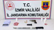 Torbalı'da jandarma baskını: Uyuşturucu haplar ve ruhsatsız silah ele geçirildi