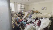 Kuşadası'nda apartman dairesinden çıkanlar şoke etti: Tonlarca atık tahliye edildi