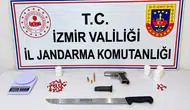 Torbalı'da jandarma baskını: Uyuşturucu haplar ve ruhsatsız silah ele geçirildi