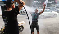 Kavurucu sıcaklara tazyikli suyla meydan okudu: Menteşe’de alışılmadık serinleme yöntemi